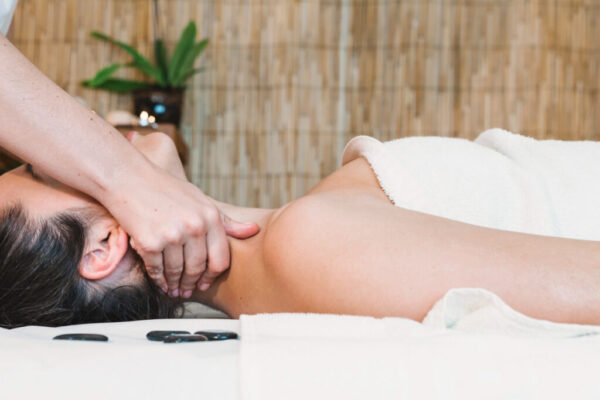 spa-massage-concept-with-relaxed-woman