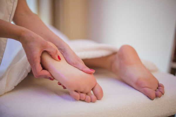 woman-getting-massage-feet